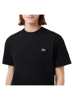 T-shirt en coton noir uni avec crocodile iconique et une coupe droite
