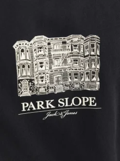 T-shirt en coton noir uni avec un building et une coupe droite à col rond