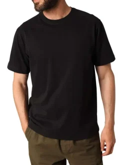T-shirt en coton noir uni avec un col rond et des manches courtes