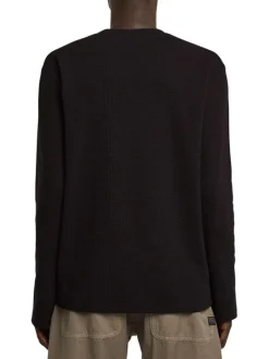 T-shirt en coton noir uni avec un col rond et une coupe droite