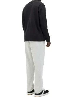 T-shirt en coton noir uni avec un col rond et une coupe droite