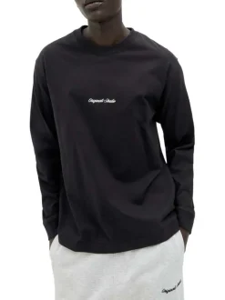 T-shirt en coton noir uni avec un col rond et une coupe droite