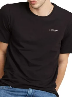 T-shirt en coton noir uni avec une col rond et une coupe droite