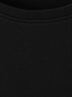 T-shirt en coton noir uni avec une coupe droite et un col rond