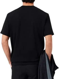 T-shirt en coton noir uni avec une coupe droite et un col rond