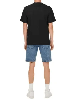 T-shirt en coton noir uni avec une coupe droite et un col rond