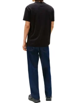T-shirt en coton noir uni avec une coupe droite et un col rond