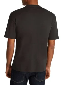 T-shirt en coton noir uni avec une coupe oversize et un col rond