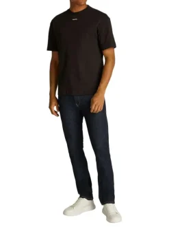 T-shirt en coton noir uni avec une coupe oversize et un col rond