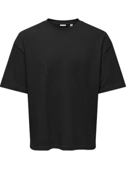 T-shirt en coton noir uni avec une coupe oversize et un col rond