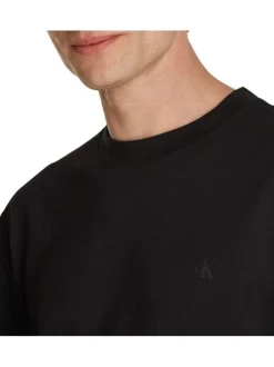 T-shirt en coton noir uni col rond et avec nom de la marque dans le dos