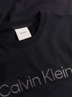 T-shirt en coton noir uni à coupe droite avec le nom de la marque imprimé