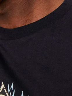 T-shirt en coton noir uni coupe droite avec un col rond et flocage tête de mort
