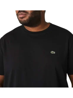 T-shirt en coton noir uni coupe droite avec un col rond et logo brodé
