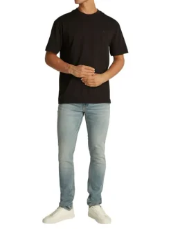 T-shirt en coton noir uni à coupe oversize avec un imprimé logo à l'arrière