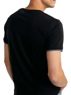 T-shirt en coton noir uni pourvu d'un col rond et de manches courtes