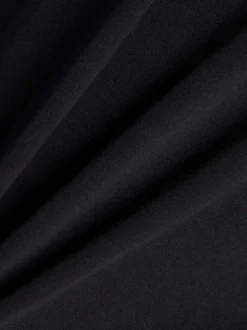 T-shirt en coton noir uni pourvu d'un col rond et de manches courtes