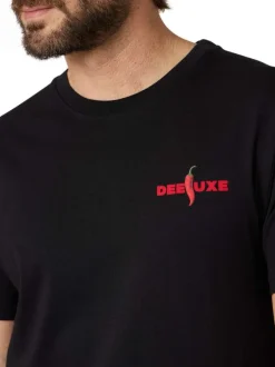 T-shirt en coton noir uni pourvu d'une coupe droite et d'un col rond