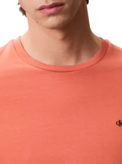 T-shirt en coton orange uni avec le logo brodé en petit et à col rond