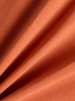 T-shirt en coton orange uni avec une coupe droite et un col rond