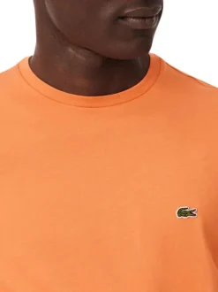 T-shirt en coton peche uni pourvu du logo brodé et d'un col rond