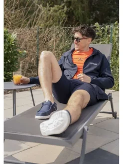 T-shirt en coton régénératif orange avec imprimé de la marque et coupe droite