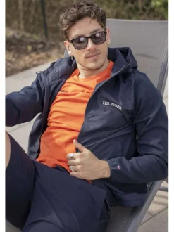 T-shirt en coton régénératif orange avec imprimé de la marque et coupe droite