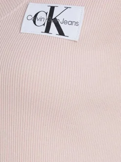 T-shirt en coton rose uni avec une coupe droite un col v et logo à l'avant