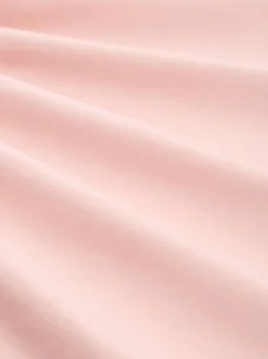 T-shirt en coton rose uni pourvu d'un col rond et d'une coupe droite