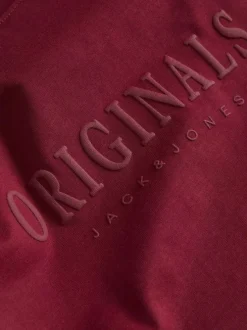T-shirt en coton rouge uni avec une coupe droite et un col rond