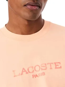 T-shirt en coton saumon à coupe droite pourvu d'un col rond texturé