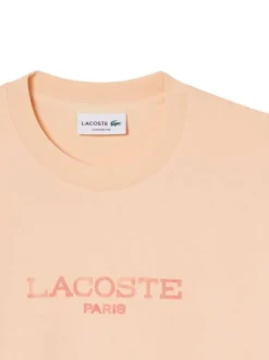 T-shirt en coton saumon à coupe droite pourvu d'un col rond texturé
