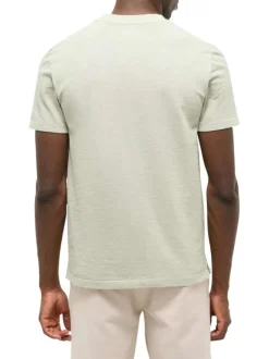 T-shirt en coton vert d'eau uni avec une coupe droite et un col tunisien