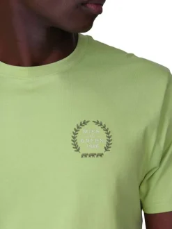 T-shirt en coton vert uni avec une coupe droite et un col rond