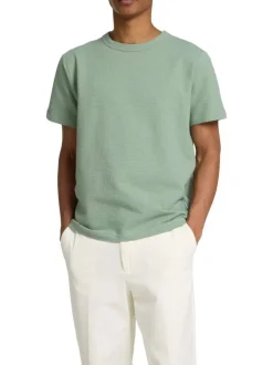 T-shirt en gaze de coton vert uni avec un col rond et une coupe droite