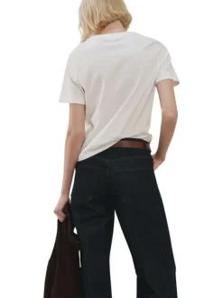 T-shirt en lin écru uni pourvu d'une coupe droite et d'un col rond