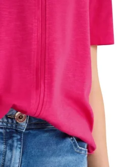 T-shirt fuchsia uni pourvu de manches courtes et d'une coupe droite