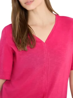 T-shirt fuchsia uni pourvu de manches courtes et d'une coupe droite