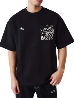 T-shirt noir uni avec une coupe ajustée un col rond et des manches courtes