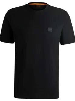 T-shirt noir uni à coupe droite et à col rond avec un petit patch carré