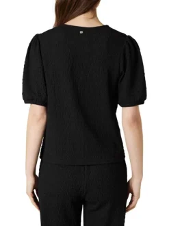 T-shirt noir uni pourvu d'une coupe ajustée et d'un col rond