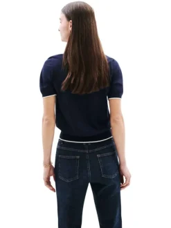 T-shirt type polo bleu marine uni avec un col v à revers et des liserés blancs