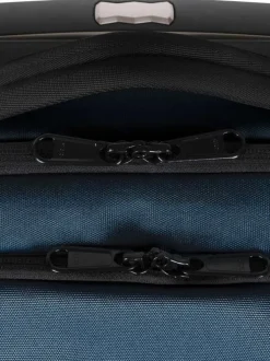 Valise bleue unie à roulettes pourvue d'une poignée télescopique