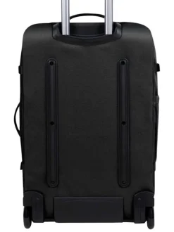 Valise noire unie souple avec plusieurs anses de transport et zips