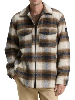 Veste beige à motif écossais avec un col chemise et manches longues