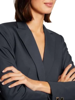 Veste blazer marine unie avec une coupe droite et des manches longues