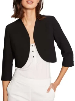 Veste blazer noire unie avec une coupe droite et des manches longues