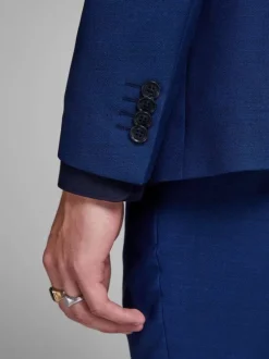 Veste bleue à coupe ajustée à col à revers et fermeture boutonnée