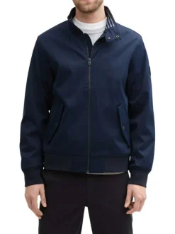 Veste bleue marine unie avec un col montant et des poches à rabat