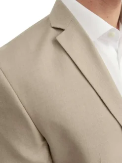 Veste de costume en laine mélangée beige avec coupe slim fit et col cranté